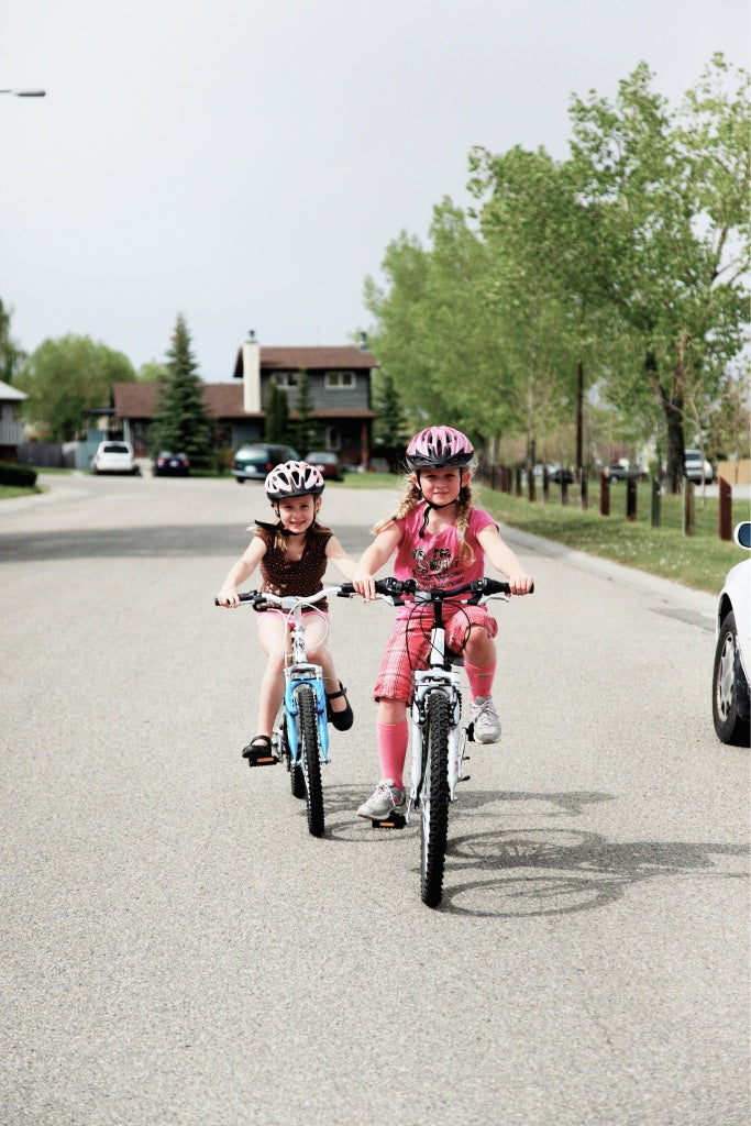 A young rider cycling outdoors